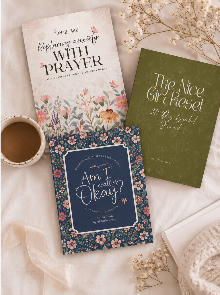 A cozy flat-lay arrangement featuring a knitted beige blanket, a speckled ceramic cup of coffee, a notebook, dried flowers, and several printed cards or booklets, including one with the title 'The Nice Girl Haze' and another with 'Am I Okay?'.